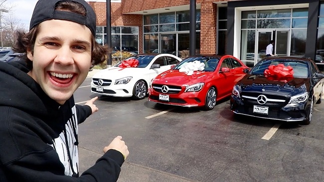 David surprises best friends with new cars